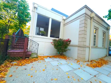 a picture of a bathroom with a bathtub