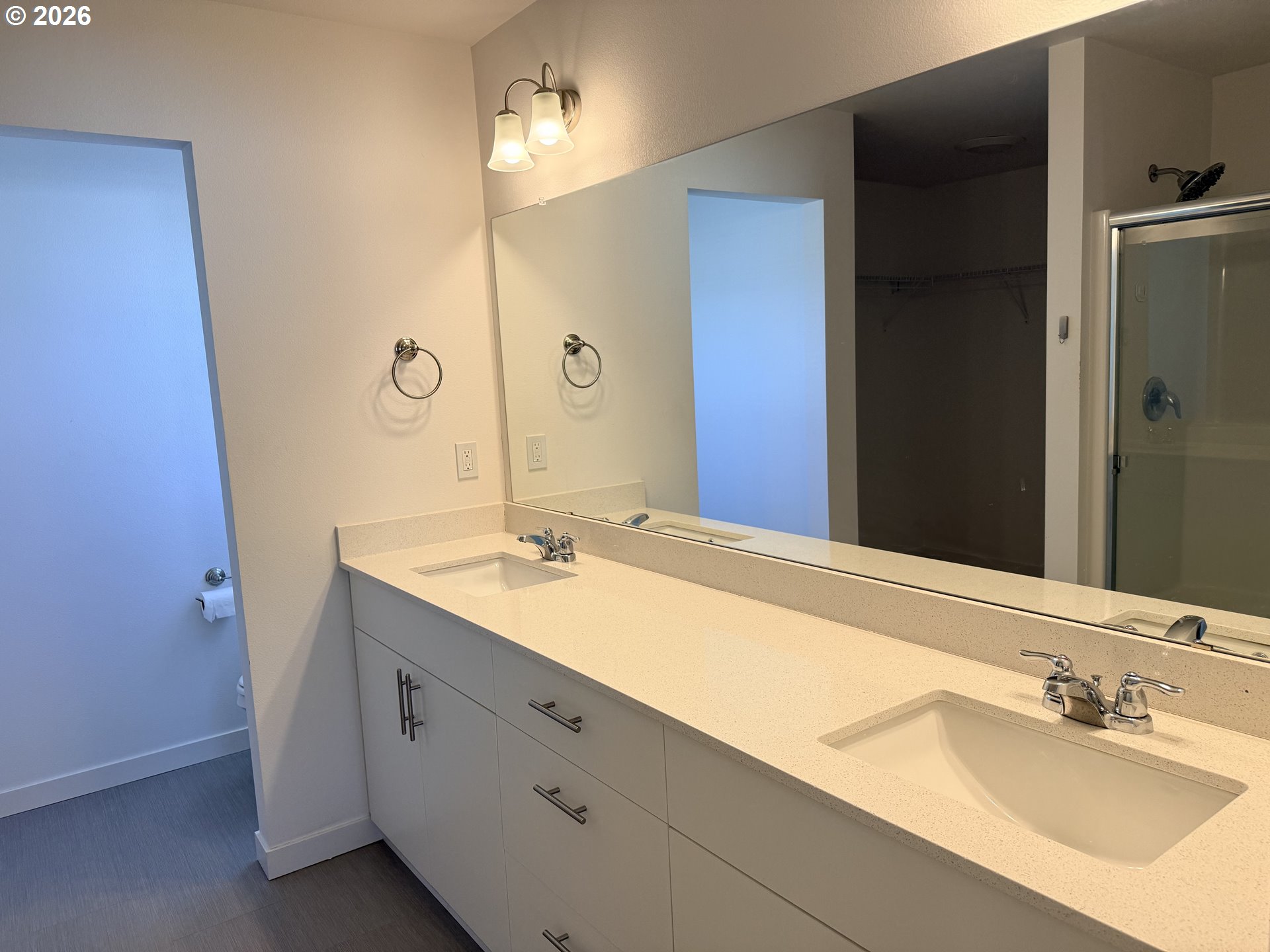 213 River Ridge Drive Boardman, OR 97818 - Photo 5 of 12 a bathroom with a granite countertop sink and a mirror