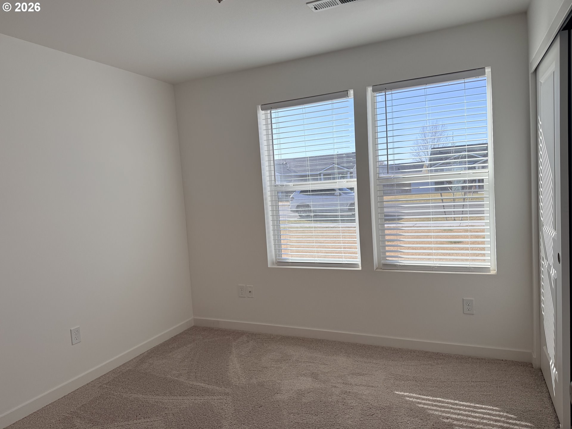 213 River Ridge Drive Boardman, OR 97818 - Photo 8 of 12 a room that has a window in it