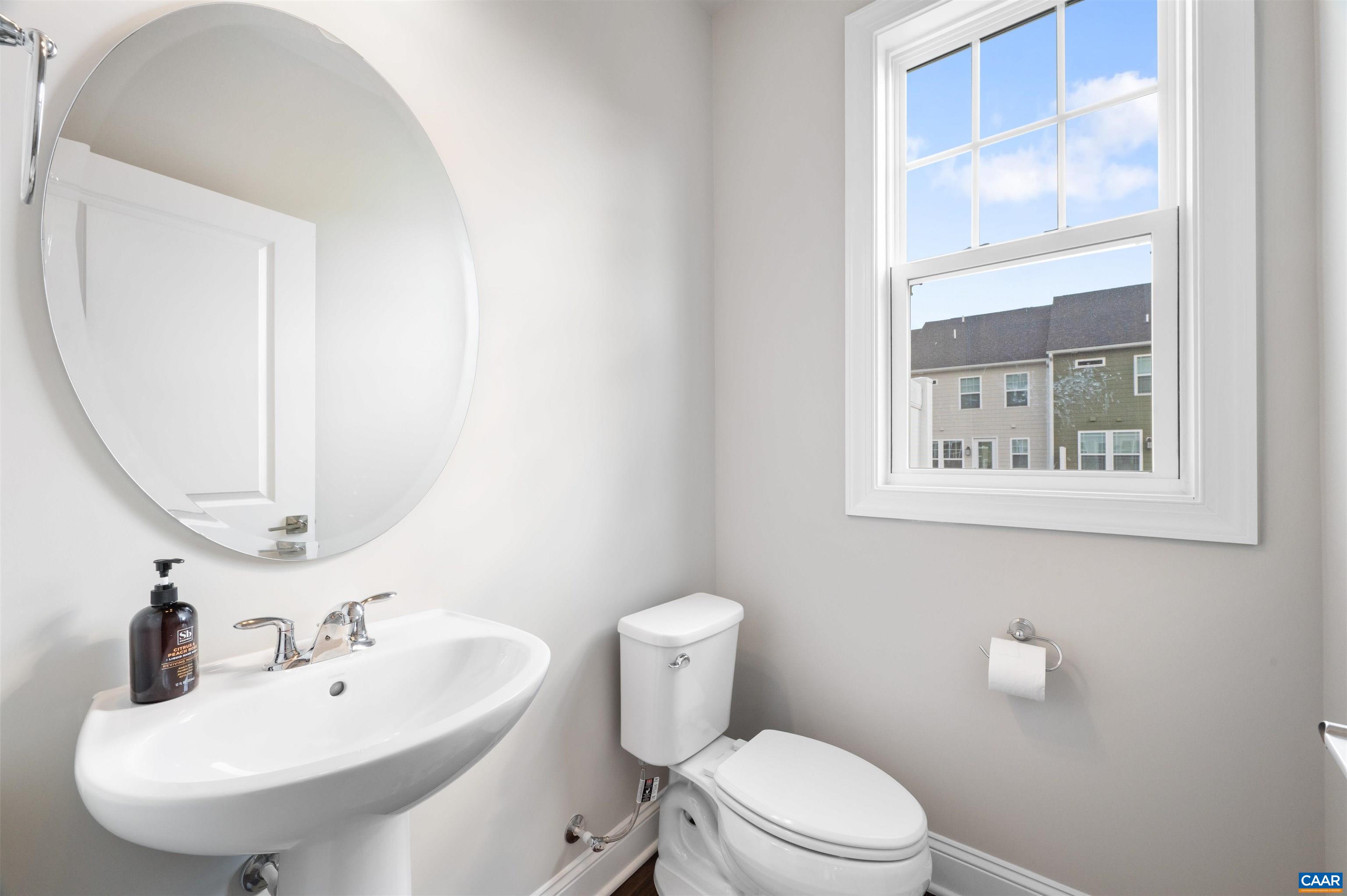 785 Park Ridge Drive Crozet, VA 22932 - Photo 23 of 50 a bathroom with a sink and a mirror