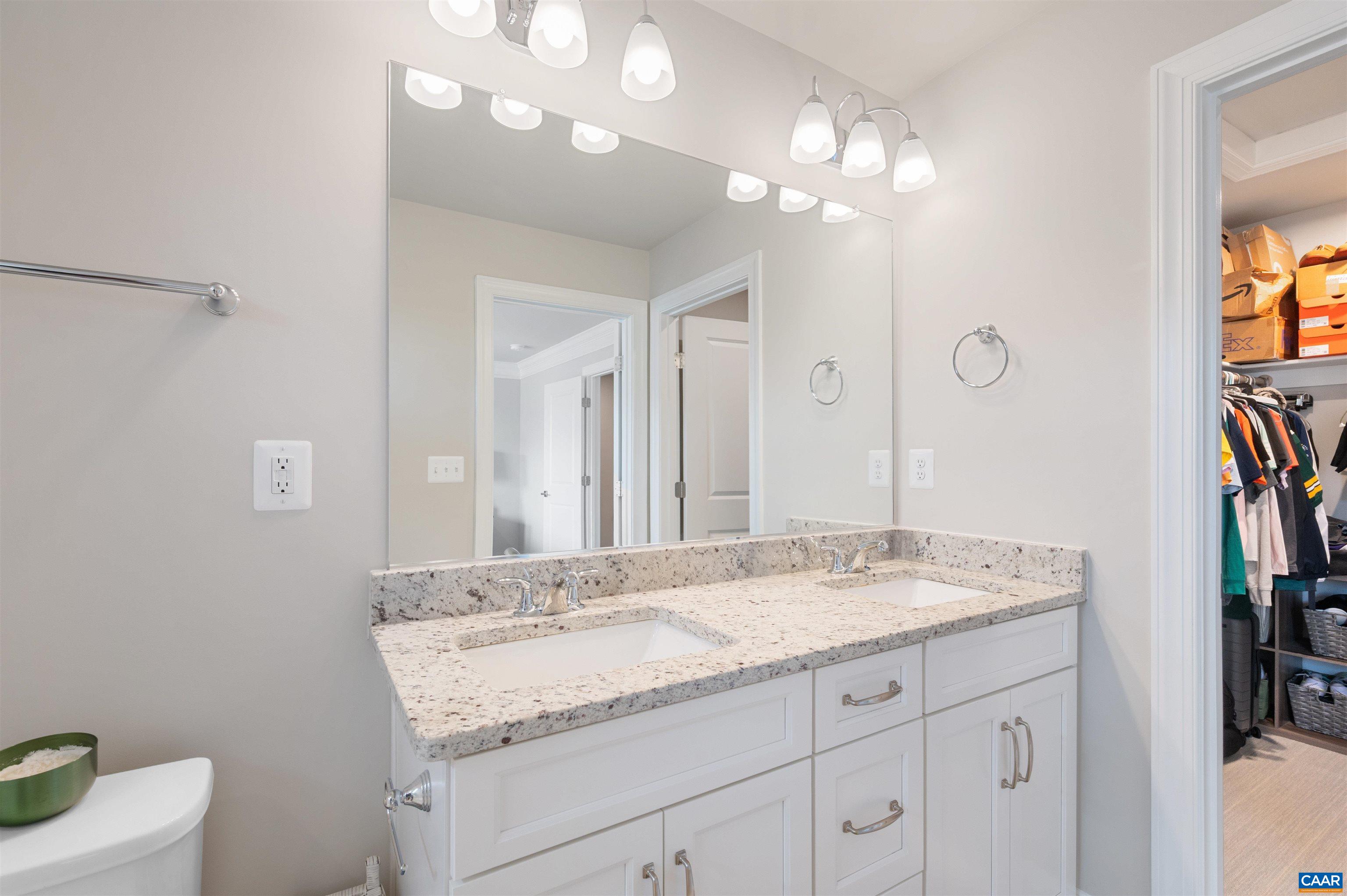785 Park Ridge Drive Crozet, VA 22932 - Photo 28 of 50 a bathroom with a granite countertop double vanity sink and a mirror