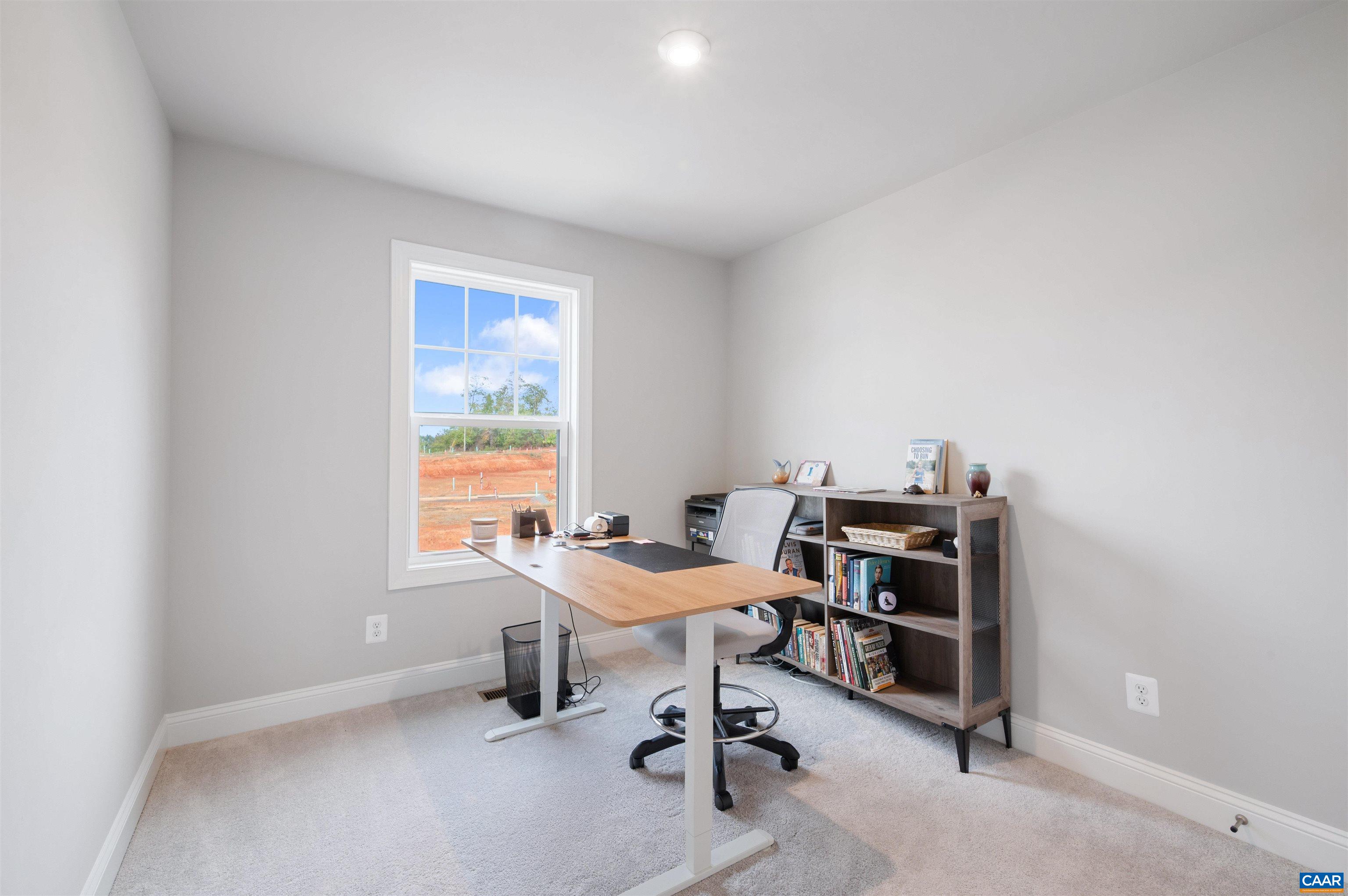 785 Park Ridge Drive Crozet, VA 22932 - Photo 32 of 50 a room with a table and chairs
