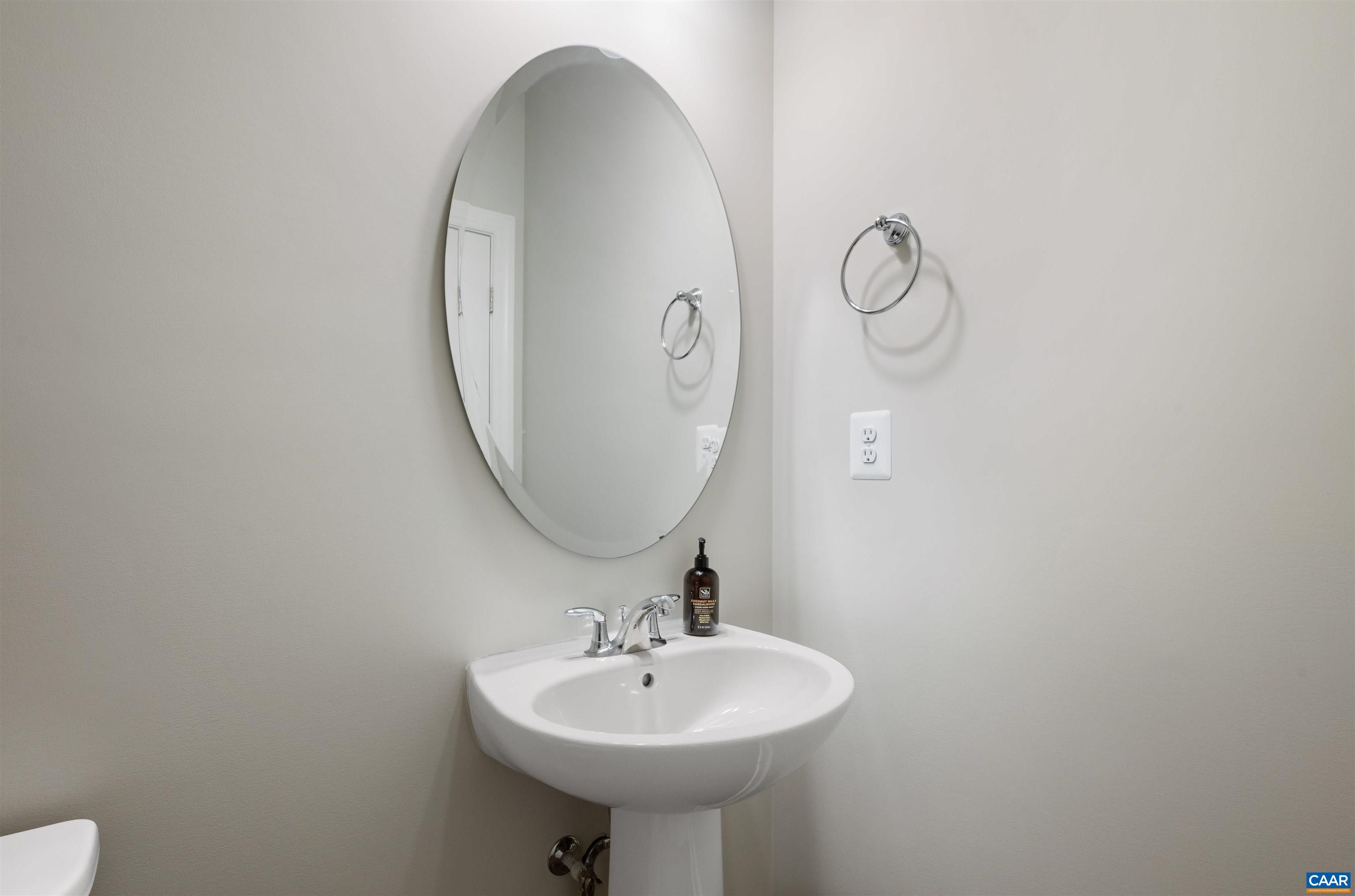 785 Park Ridge Drive Crozet, VA 22932 - Photo 38 of 50 a bathroom with a sink and a mirror