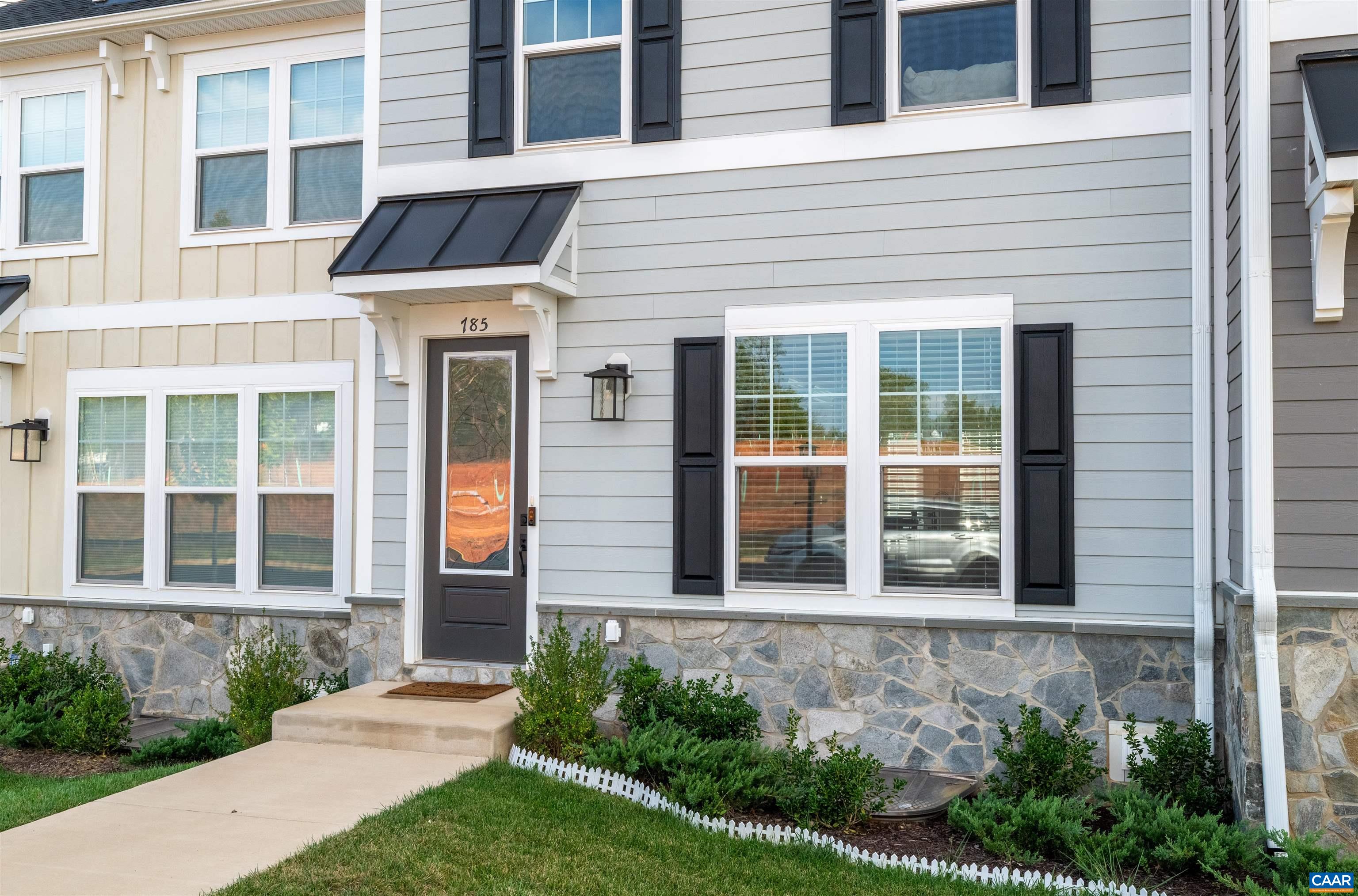 785 Park Ridge Drive Crozet, VA 22932 - Photo 6 of 50 a front view of a house with a yard