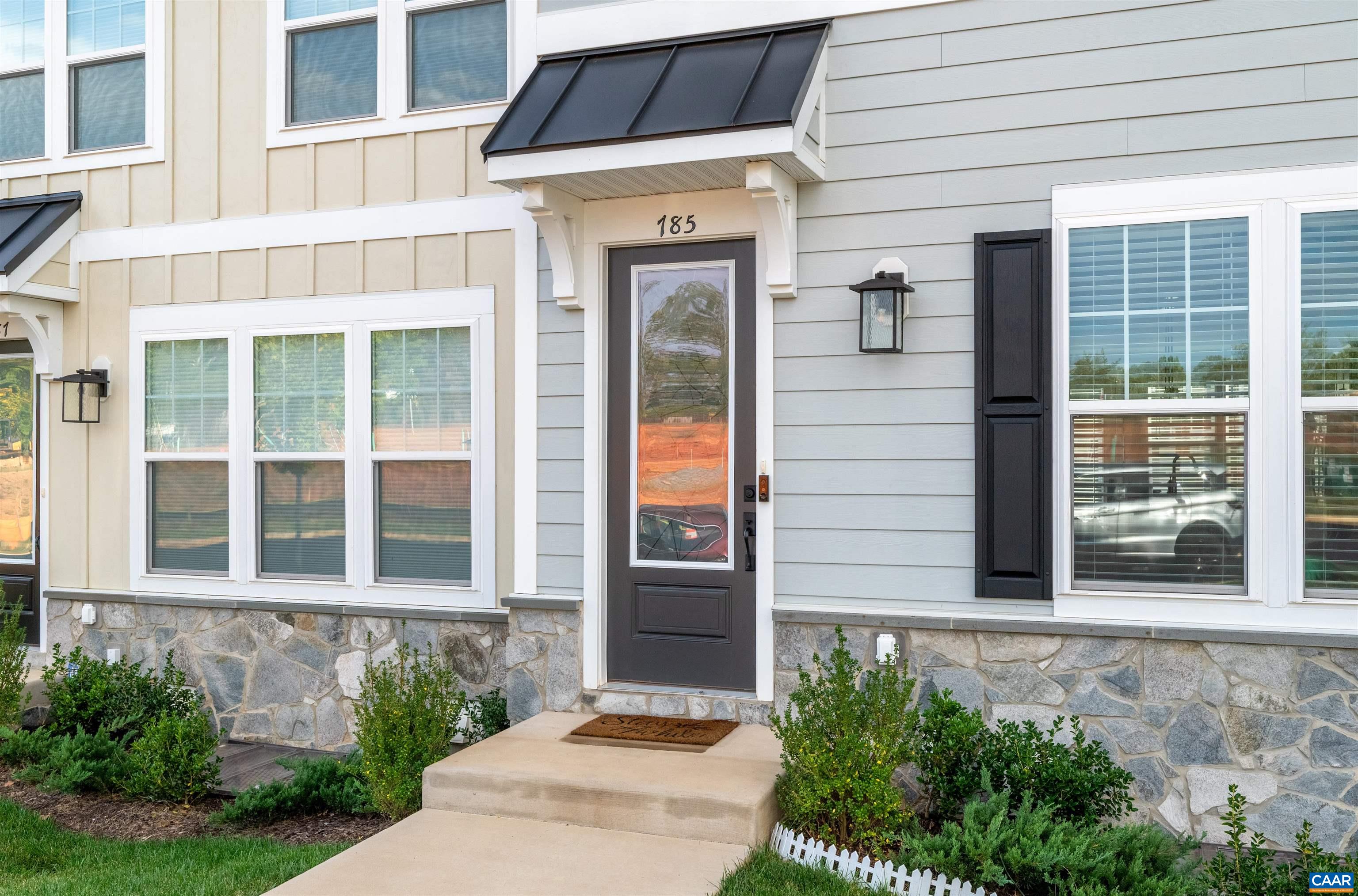 785 Park Ridge Drive Crozet, VA 22932 - Photo 7 of 50 a front view of a house with a yard