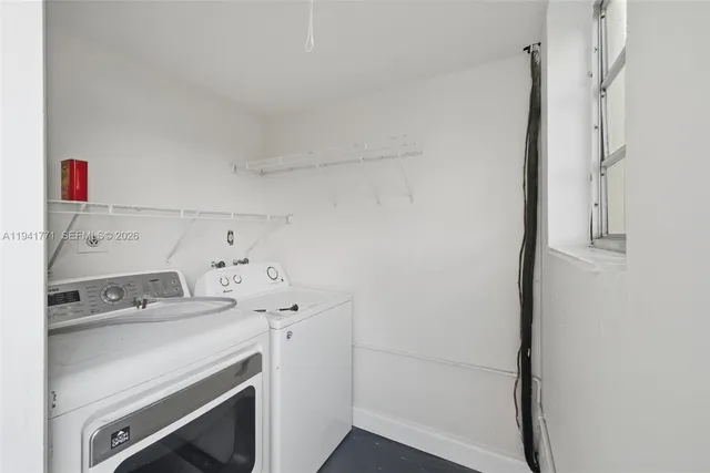 a backyard of a house with seating space