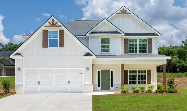 front view of a house and a yard