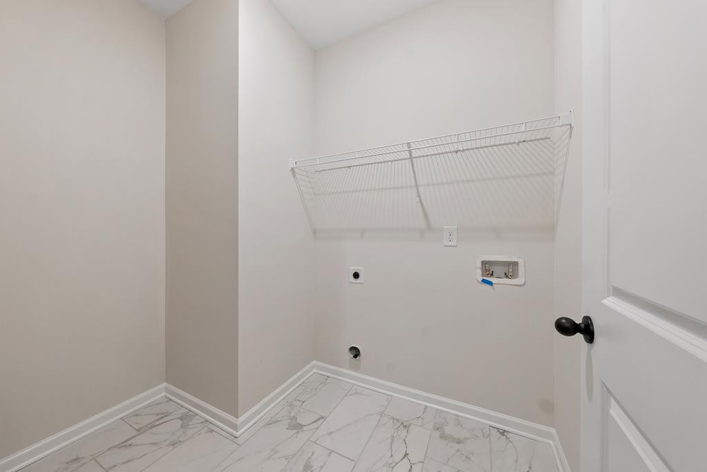 575 Bohannon Road Grantville, GA 30220 - Photo 15 of 33 a view of a room with racks on the wall