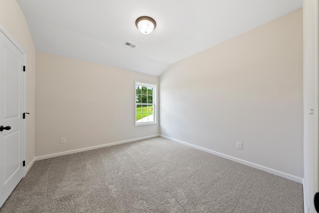 575 Bohannon Road Grantville, GA 30220 - Photo 21 of 33 an empty room with a window