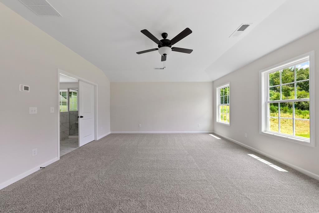 575 Bohannon Road Grantville, GA 30220 - Photo 24 of 33 a view of a livingroom with a ceiling fan and window