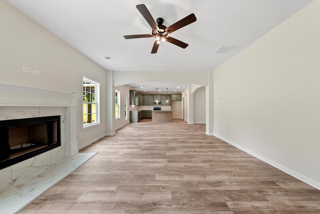 575 Bohannon Road Grantville, GA 30220 - Photo 5 of 33 a workspace with fireplace cabinet and windows