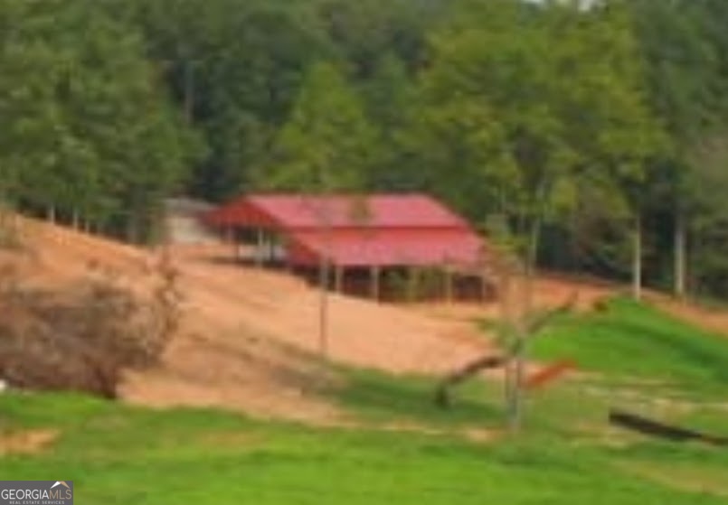5633 Hulsey Town Road Dallas, GA 30157 - Photo 3 of 9 a view of a backyard