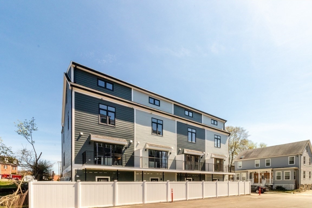 15 Tanglewood Road, Unit A Boston, MA 02126 - Photo 22 of 28 a front view of a building