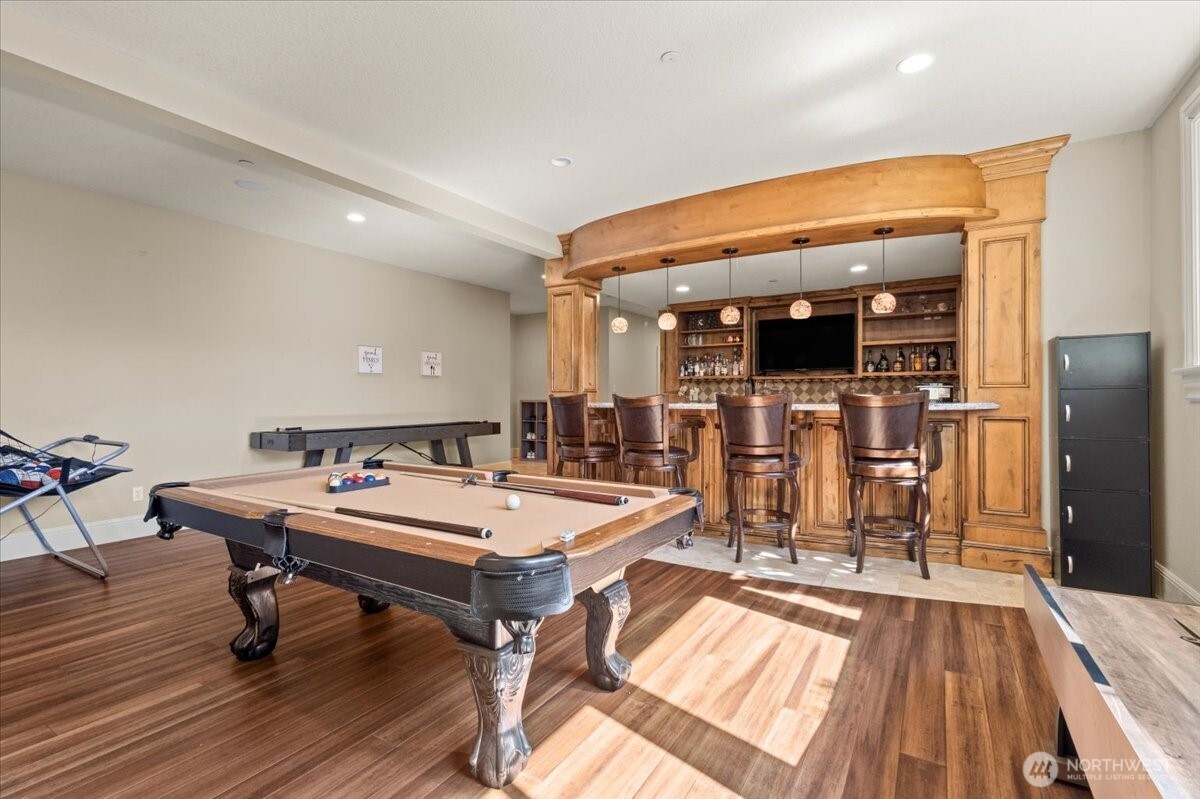 1931 Northwest 7th Avenue Camas, WA 98607 - Photo 23 of 40 a room with gym equipment and wooden floor