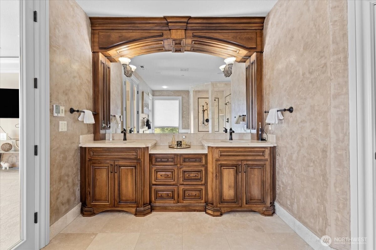 1931 Northwest 7th Avenue Camas, WA 98607 - Photo 29 of 40 a spacious bathroom with a double vanity sink and a mirror