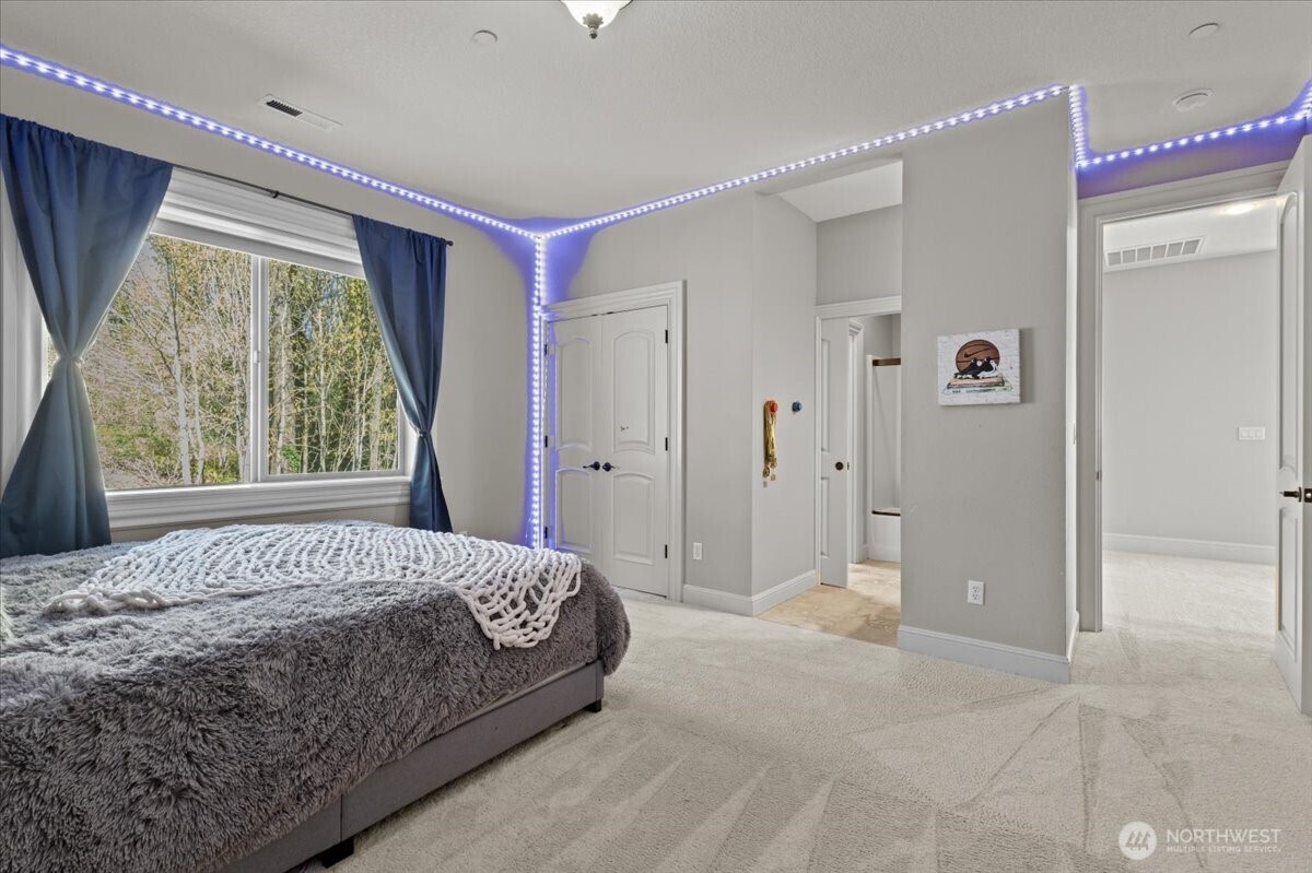 1931 Northwest 7th Avenue Camas, WA 98607 - Photo 35 of 40 a bedroom with a large bed and a window