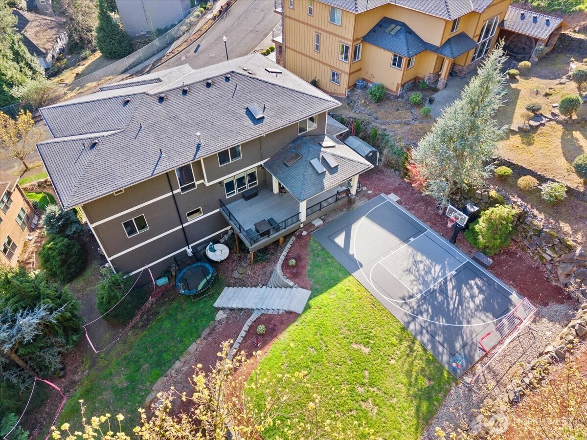 1931 Northwest 7th Avenue Camas, WA 98607 - Photo 39 of 40 an aerial view of a house with a big yard and a large pool
