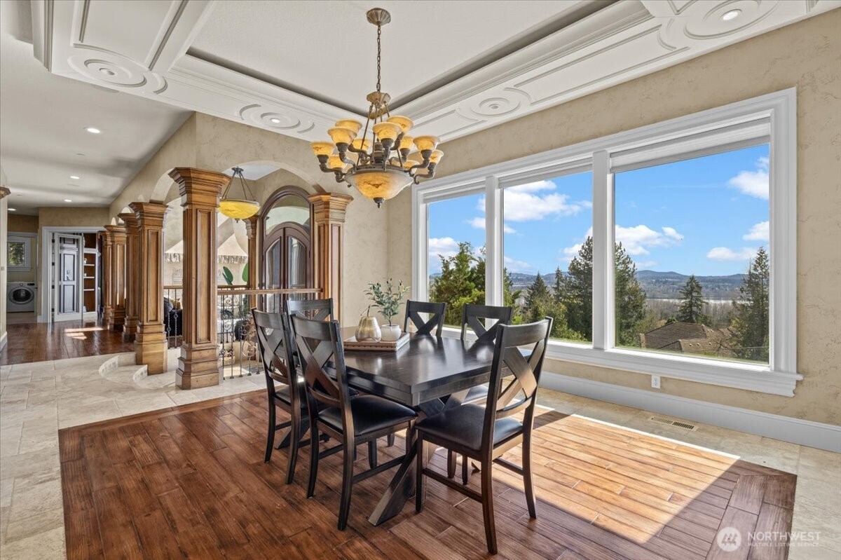 1931 Northwest 7th Avenue Camas, WA 98607 - Photo 5 of 40 a view of a dining room with furniture window and wooden floor