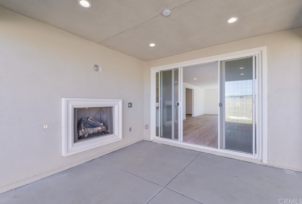 32324 Sonder Way Temecula, CA 92591 - Photo 11 of 17 an empty room and fire place
