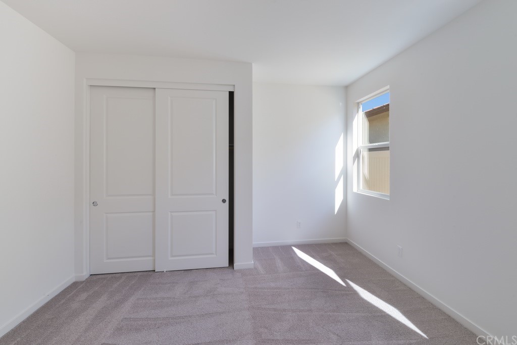 32324 Sonder Way Temecula, CA 92591 - Photo 6 of 17 a view of an empty room with a window