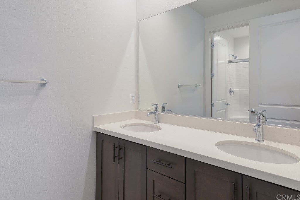 32324 Sonder Way Temecula, CA 92591 - Photo 7 of 17 a bathroom with a sink and a mirror