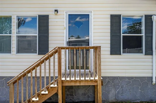 a view of staircase with black and white walls