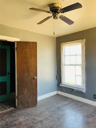 a bathroom with a toilet and a sink