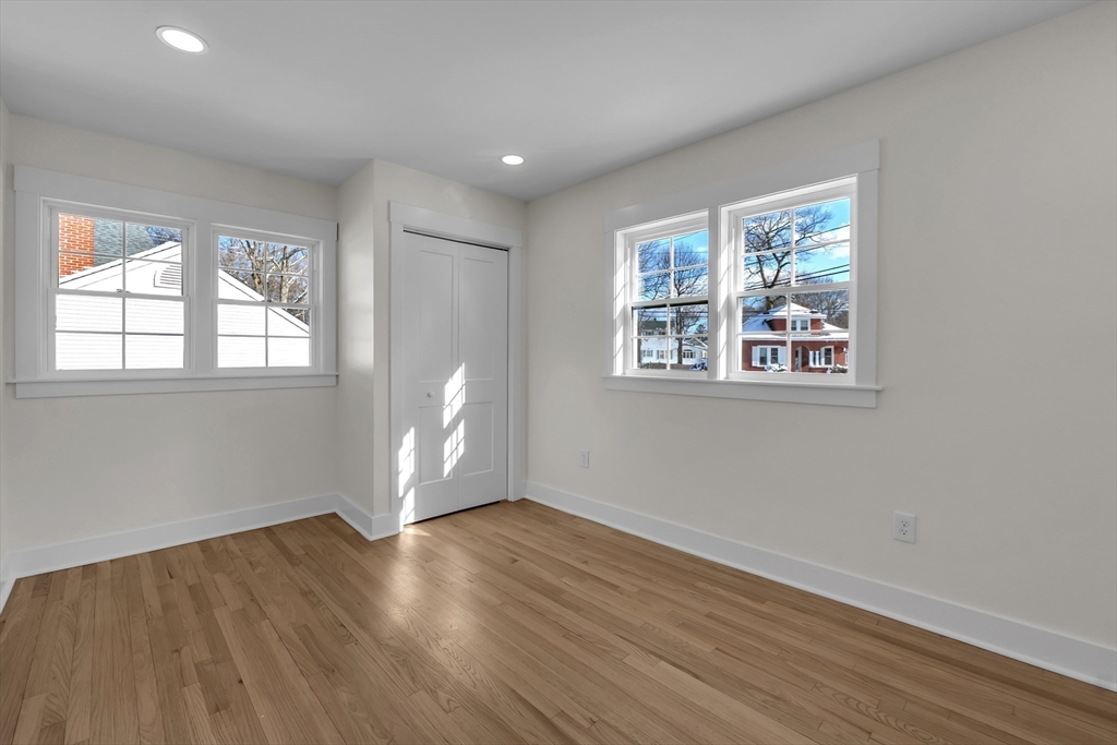 4 Hancock Street Shrewsbury, MA 01545 - Photo 16 of 33 a view of empty room with wooden floor and fan