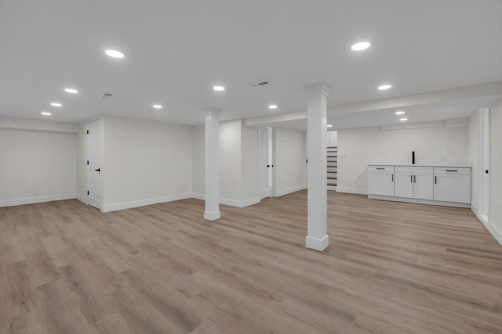 4 Hancock Street Shrewsbury, MA 01545 - Photo 22 of 33 a view of a kitchen with wooden floor
