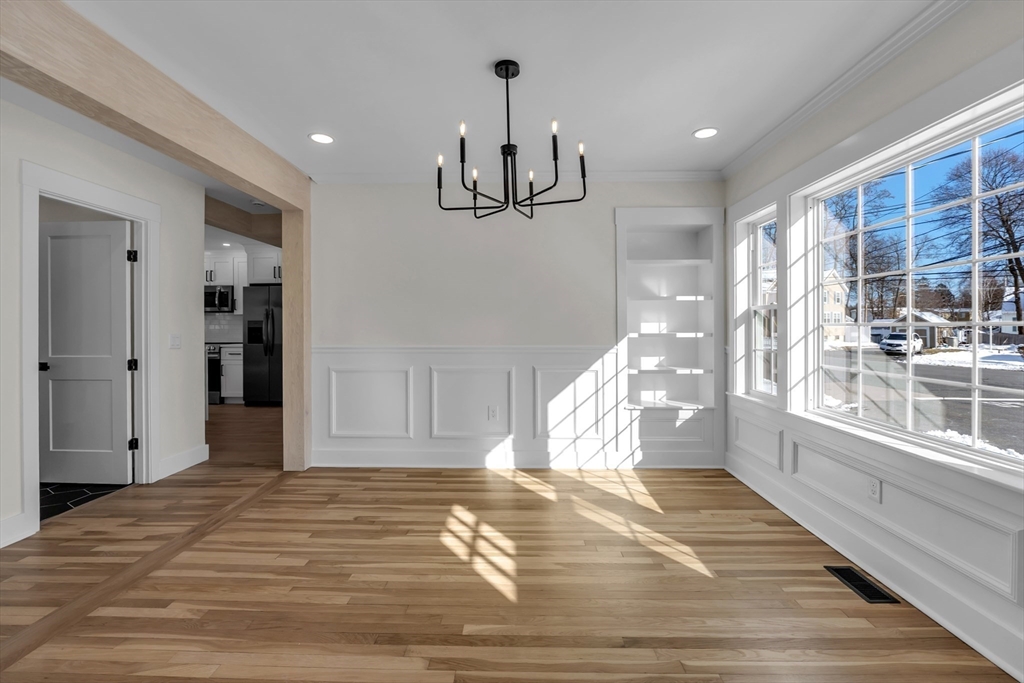 4 Hancock Street Shrewsbury, MA 01545 - Photo 8 of 33 a view of empty room with wooden floor and fan