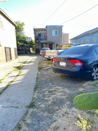 a cars parked in front of a house
