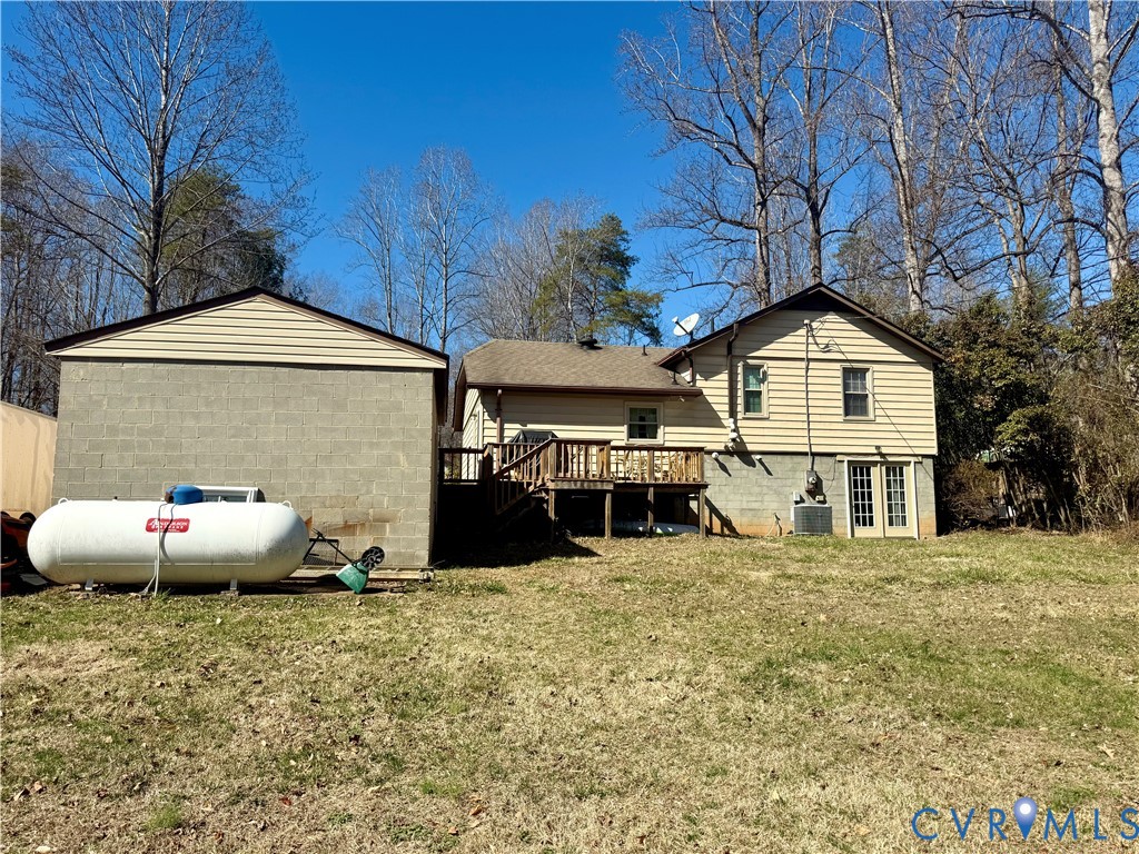 655 Holly Corner Road Fredericksburg, VA 22406 - Photo 29 of 35 a view of a house with a yard
