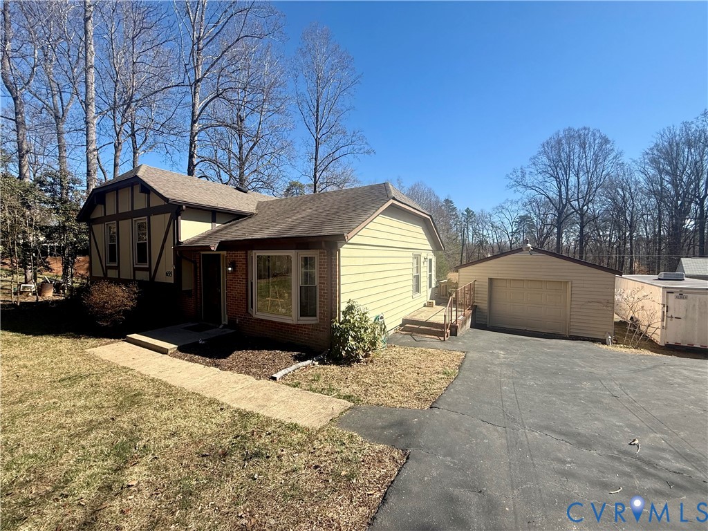655 Holly Corner Road Fredericksburg, VA 22406 - Photo 31 of 35 a front view of a house with a yard