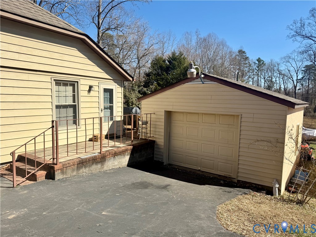 655 Holly Corner Road Fredericksburg, VA 22406 - Photo 32 of 35 a view of a house with a outdoor space