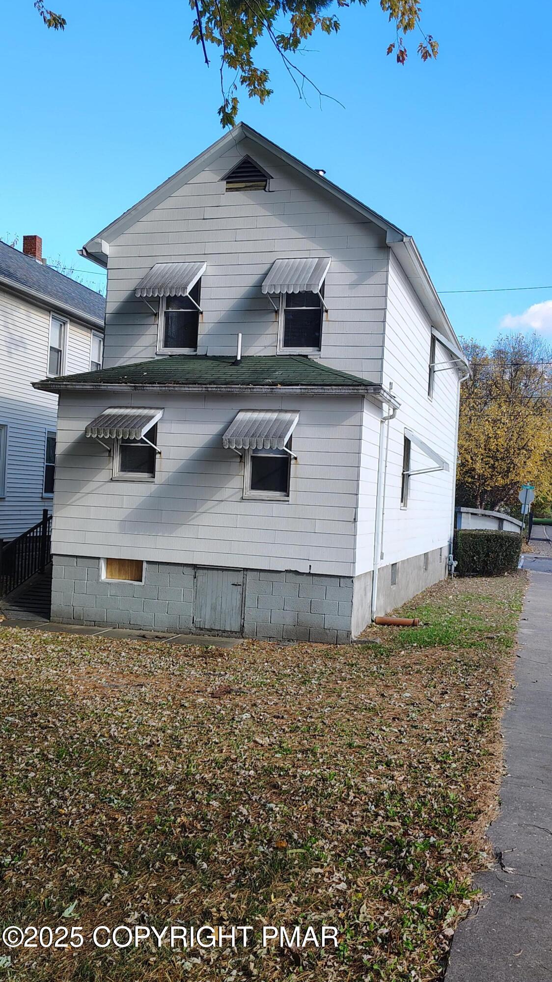 258 Factory Street Luzerne, PA 18709 - Photo 19 of 22 a view of a house with a yard