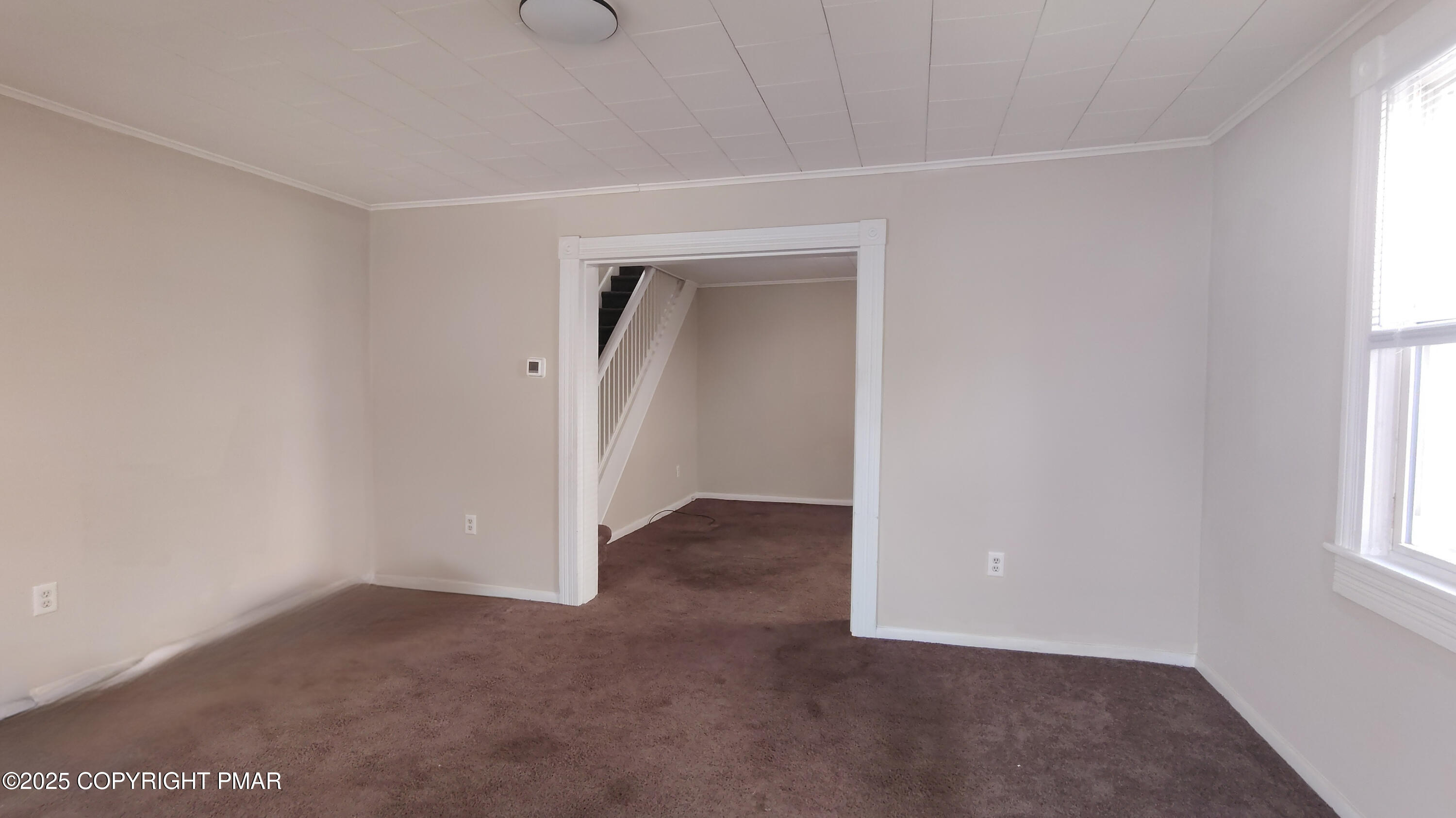 258 Factory Street Luzerne, PA 18709 - Photo 2 of 22 a view of an empty room with a window