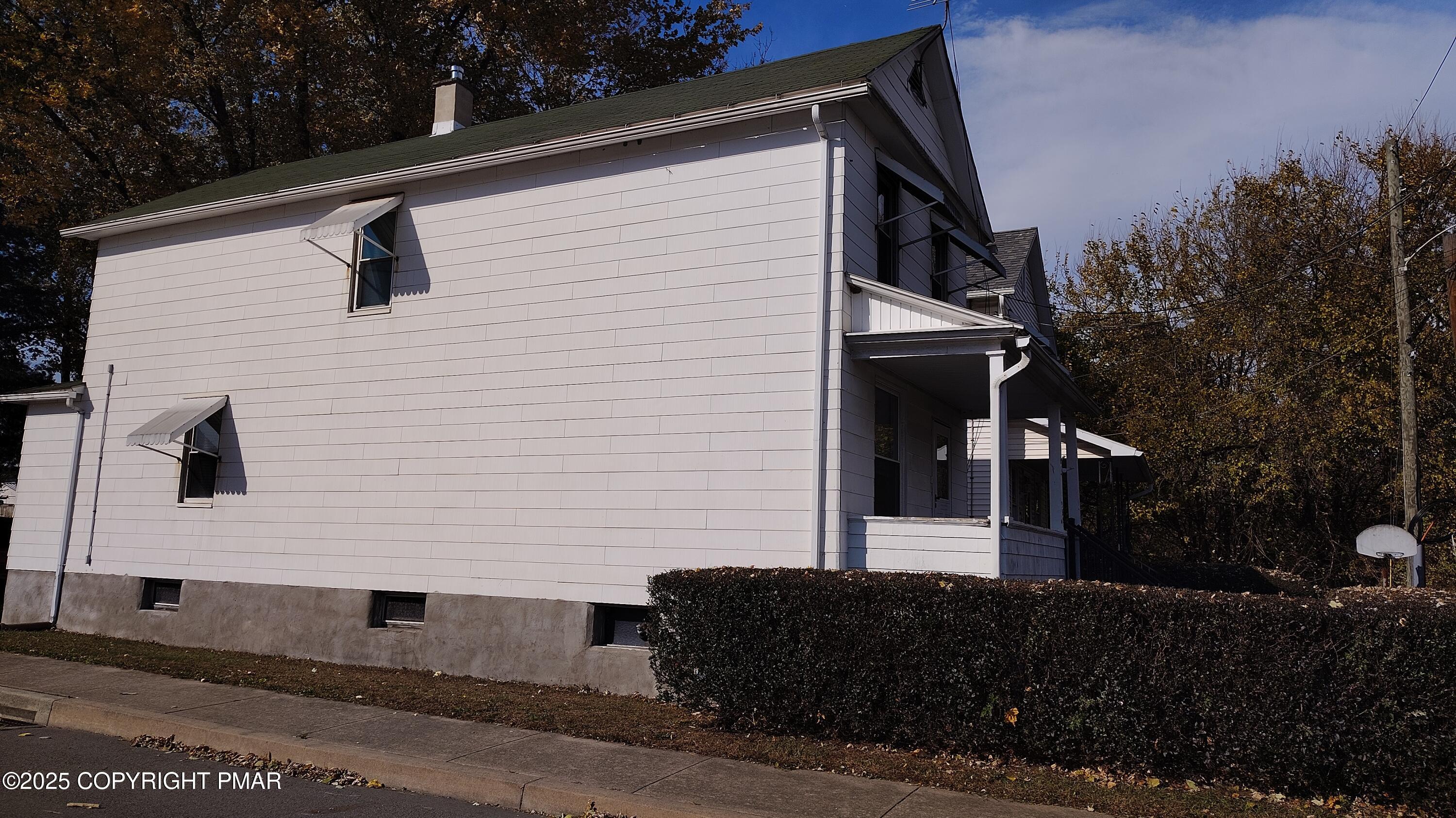 258 Factory Street Luzerne, PA 18709 - Photo 21 of 22 a front view of a house with garage