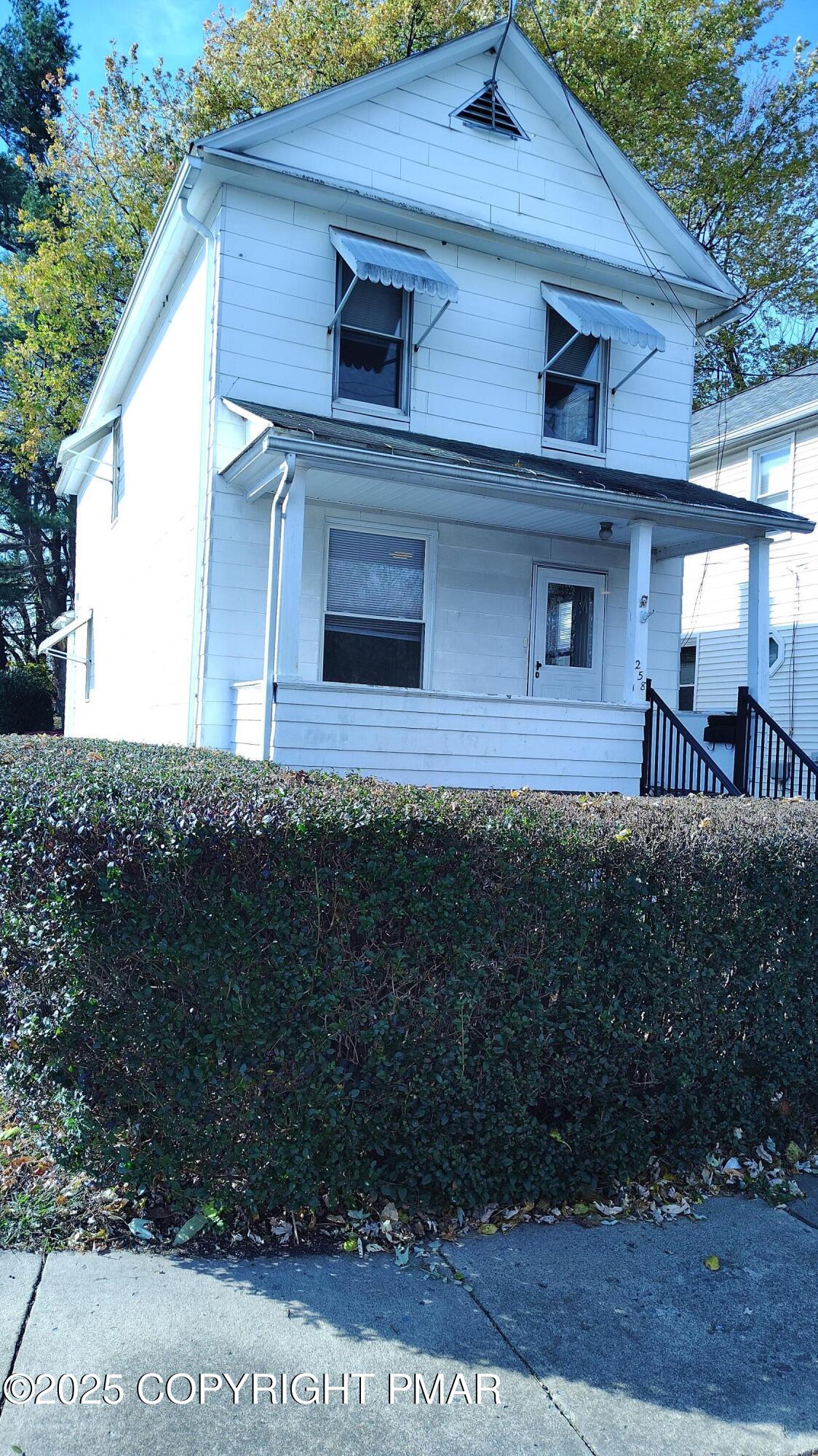 258 Factory Street Luzerne, PA 18709 - Photo 22 of 22 a front view of a house with a yard