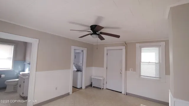 a view of entryway with bathroom