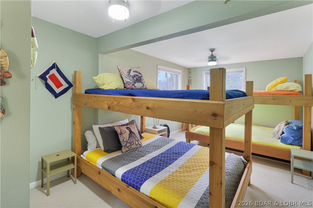 29966 Oak Knoll Road Rocky Mount, MO 65072 - Photo 27 of 68 The large bunk room provides plenty of sleeping sp