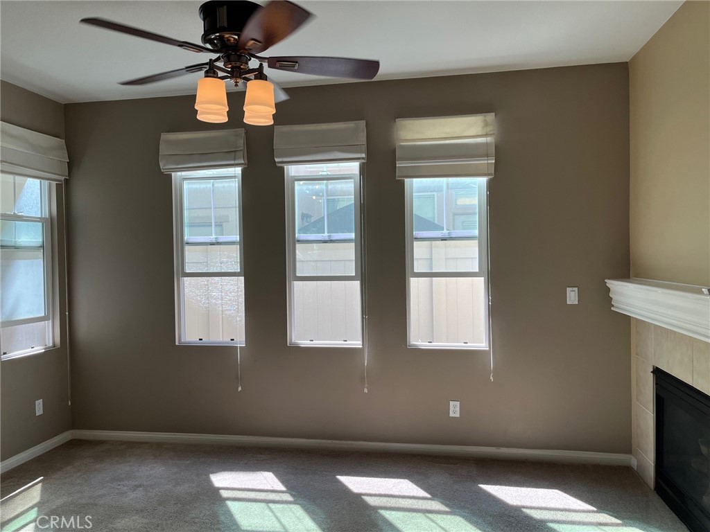 31885 Jaybee Lane Temecula, CA 92592 - Photo 2 of 35 a view of room with a ceiling fan and a window