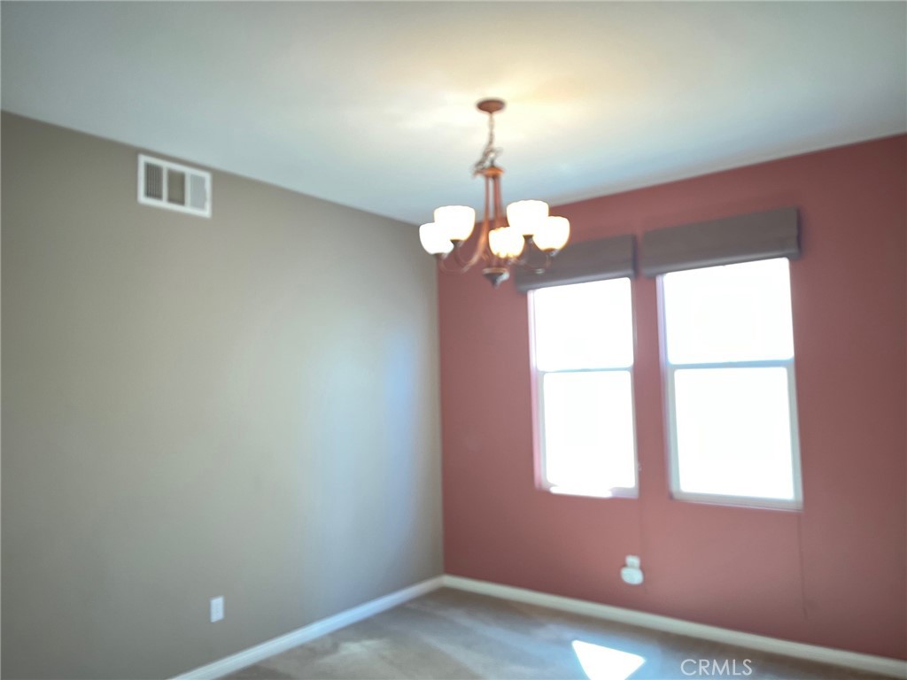 31885 Jaybee Lane Temecula, CA 92592 - Photo 5 of 35 wooden floor in an empty room with a window