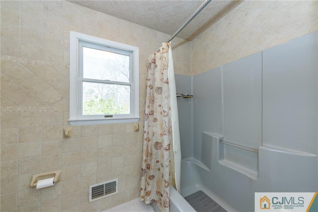 12 Thompson Bridge Road Jackson, NJ 08527 - Photo 14 of 25 a bathroom with a shower