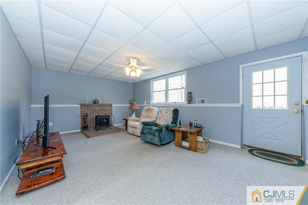 12 Thompson Bridge Road Jackson, NJ 08527 - Photo 20 of 25 a room with gym equipment and a window