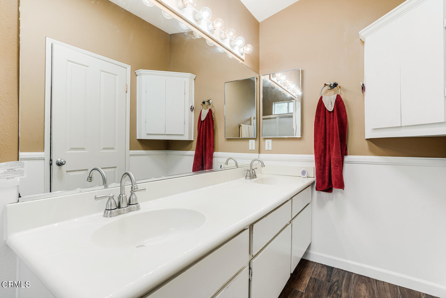 2911 Pico Place Oxnard, CA 93033 - Photo 16 of 25 a bathroom with a sink and a mirror