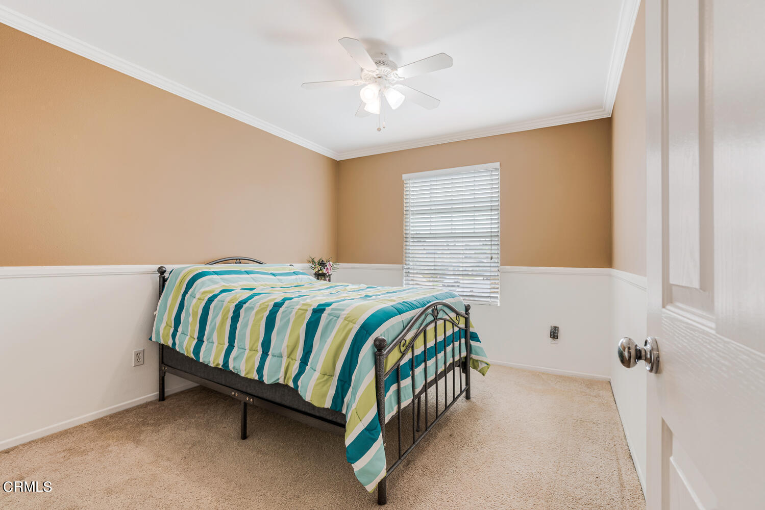 2911 Pico Place Oxnard, CA 93033 - Photo 20 of 25 a bedroom with a bed and a chandelier