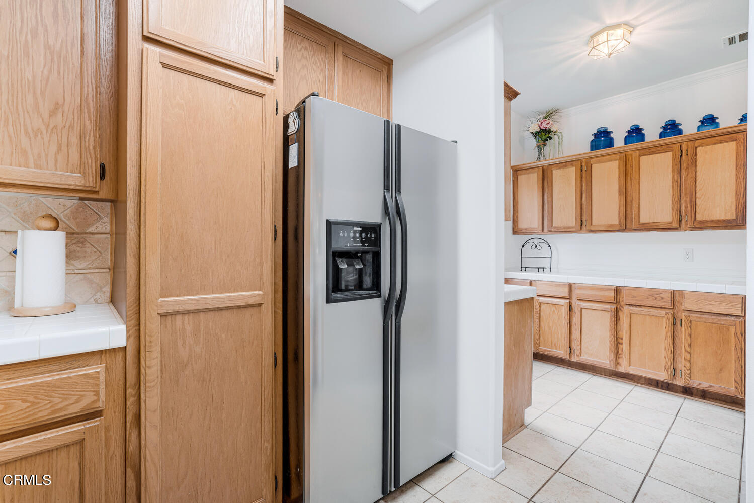 2911 Pico Place Oxnard, CA 93033 - Photo 9 of 25 a kitchen with stainless steel appliances granite countertop a refrigerator and a sink