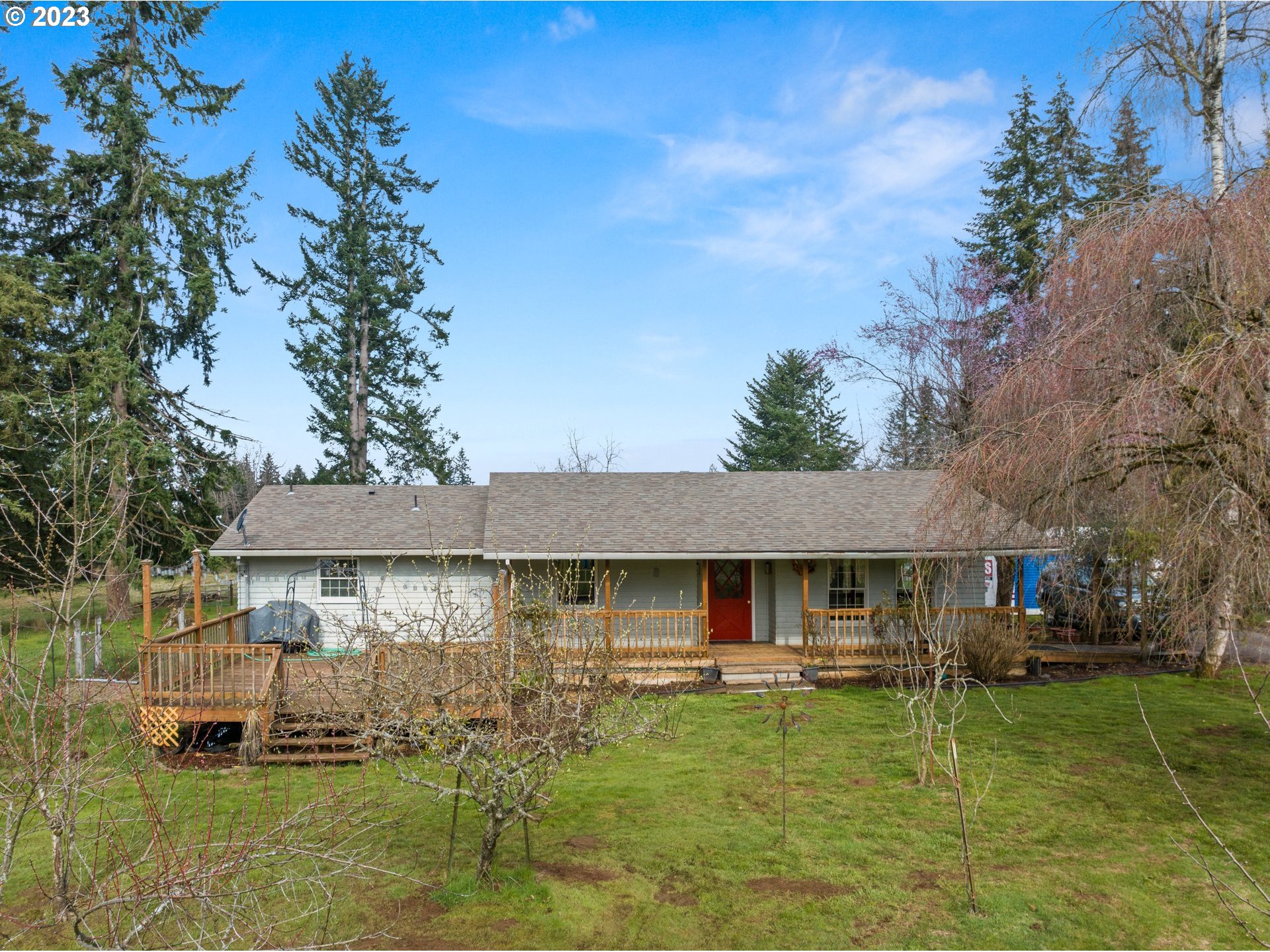 front view of a house with a yard