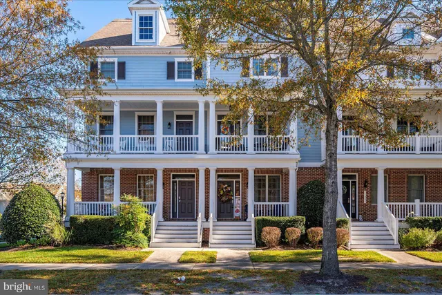 a front view of a building with garden
