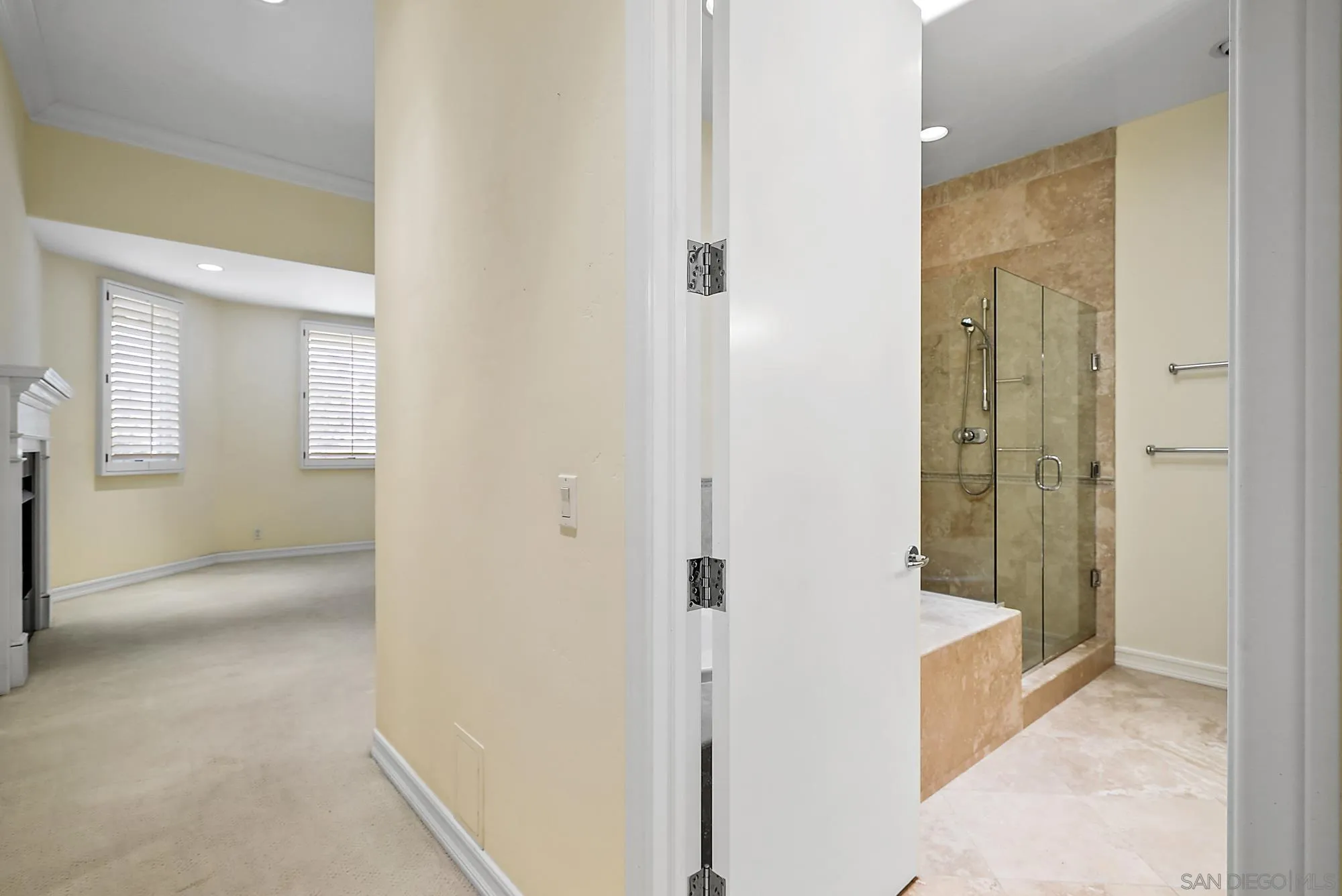 7836 Ivanhoe Avenue La Jolla, CA 92037 - Photo 18 of 31 a view of a bathroom from a hallway